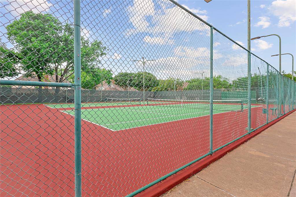 Enjoy the neighborhood tenniscourts.