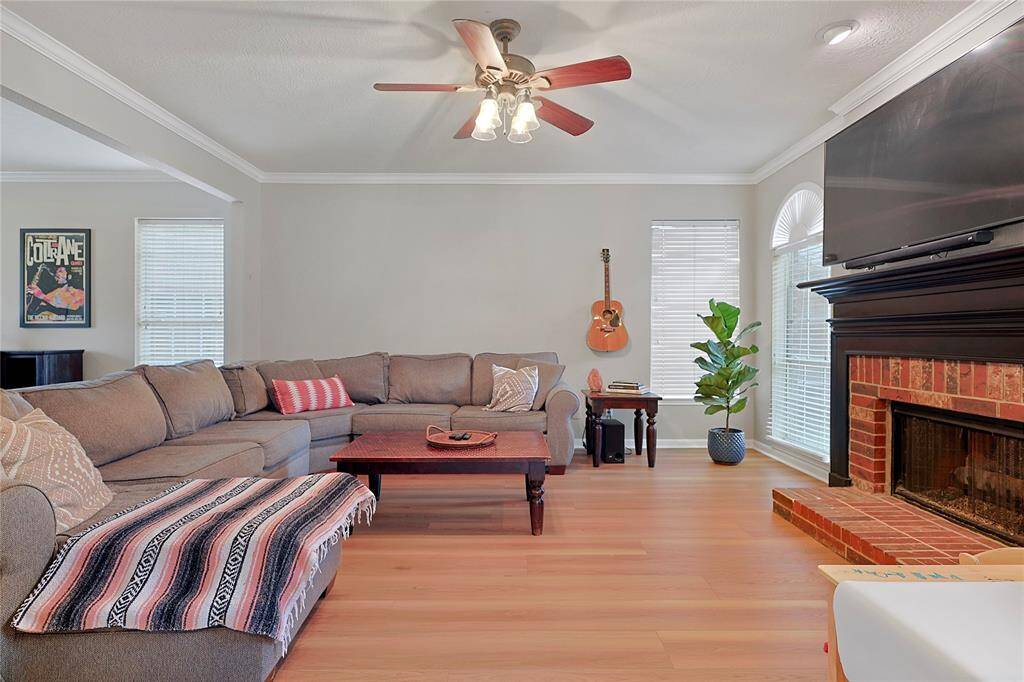 At the heart of the space, a fireplaceadds a cozy focal point, providingwarmth and charm.