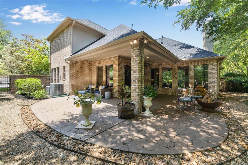 This seamless indoor-outdoor connection fills the home with natural light and provides the ideal setting for relaxing or entertaining year-round.
