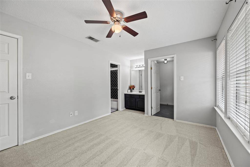 Second of 3 secondary bedrooms.