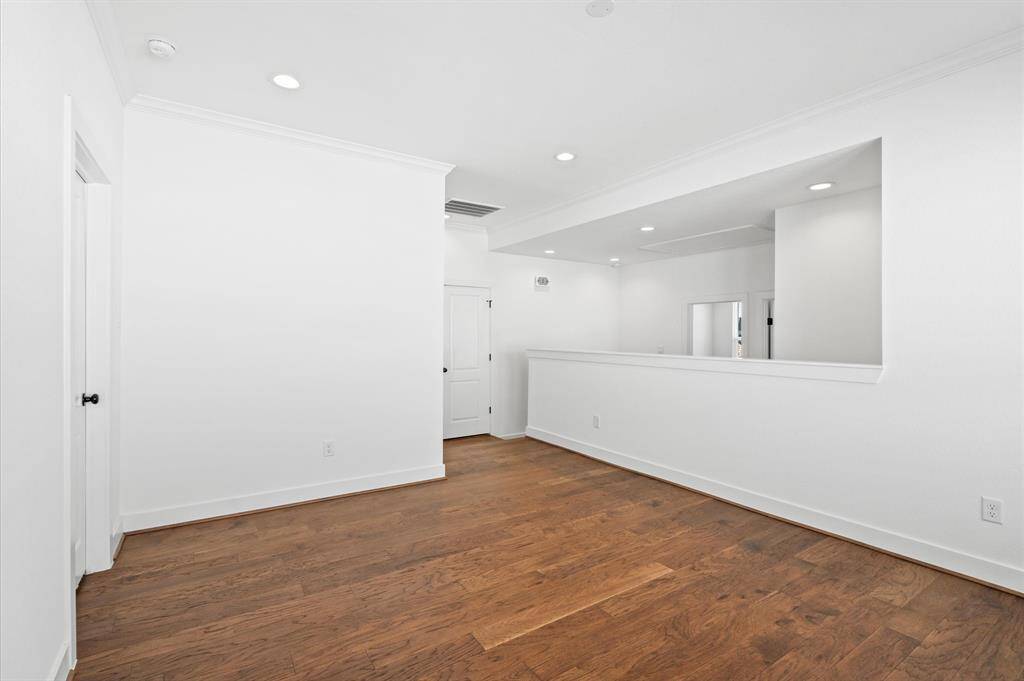 Housed at the entry point of the second level, the utility room houses a full-sized washer and dryer that can be installed side-by-side for you to take care of your laundry needs with ease.