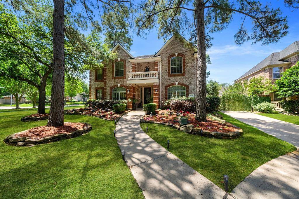 Large driveway with privacy gate.