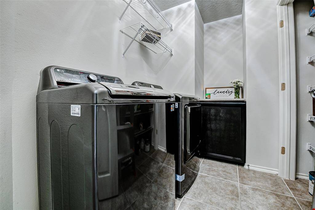 Utility room off the kitchen, and on the way to bedrooms