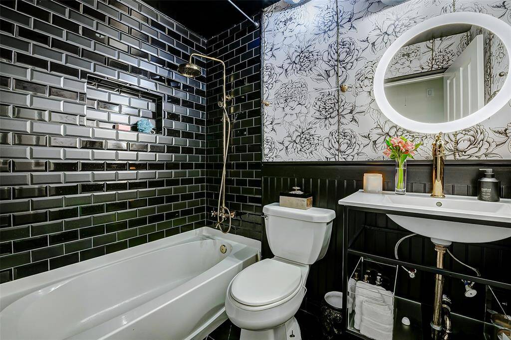 Wait until you see the show-stopping secondary bathroom.