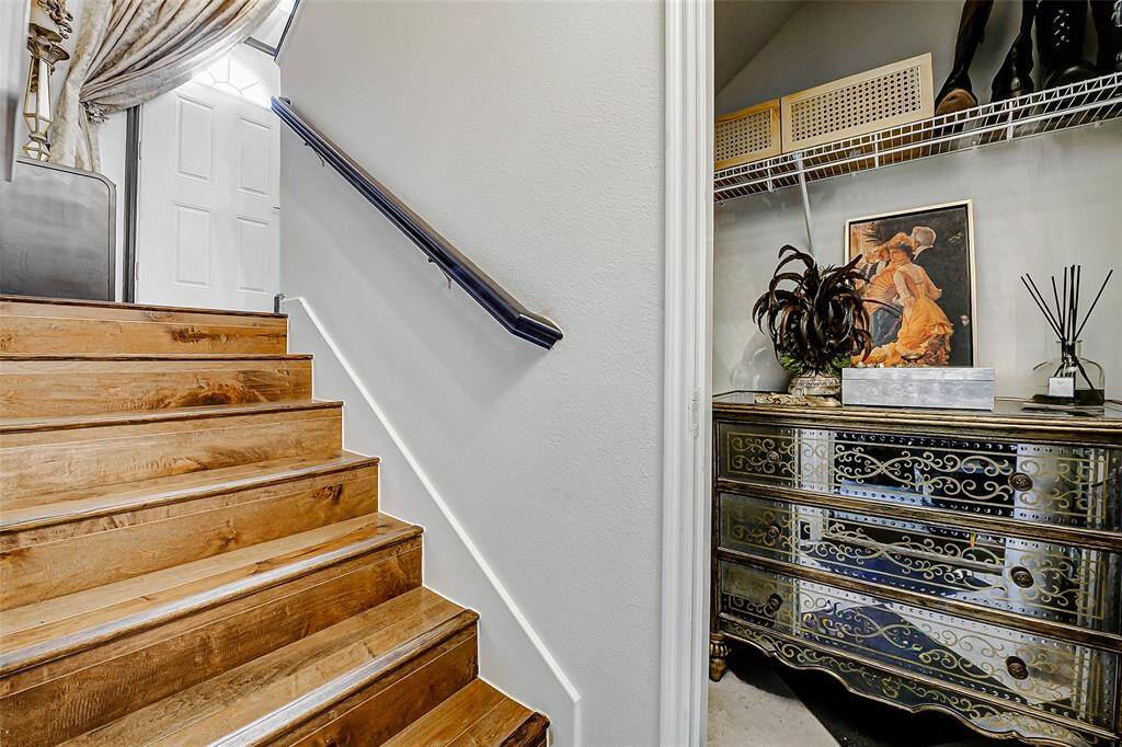 These stairs lead from the garage on the ground floor, to the rest of the home. Fabulous storage upon entry!