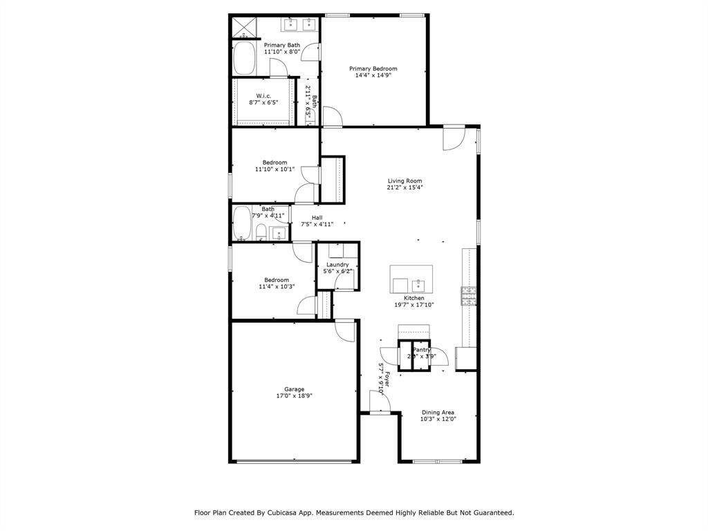 This floor plan features a spacious primary bedroom with an en-suite bath and walk-in closet, two additional bedrooms, a shared bathroom, a large living room, an open kitchen with a pantry, a dining area, laundry room, and a two-car garage.