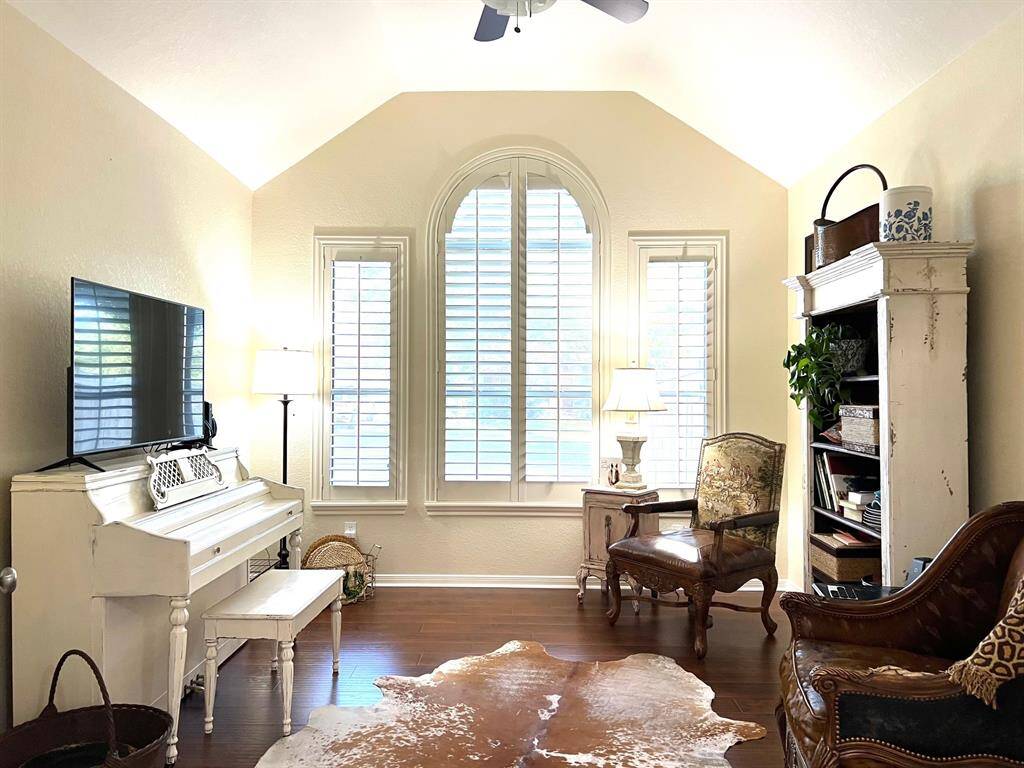 Private media room with French doors -make it the 4th bedroom.
