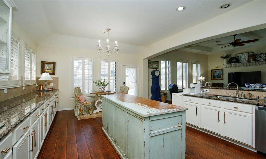 Kitchen overlooks the den which makes entertaining a breeze.