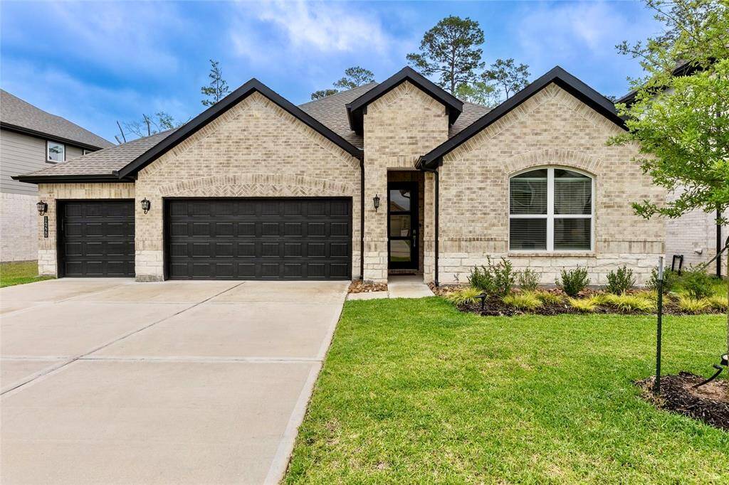 View of Front of Home- 4 Bedroom 3 2 Full Bathrooms with a 3 Car Garage
