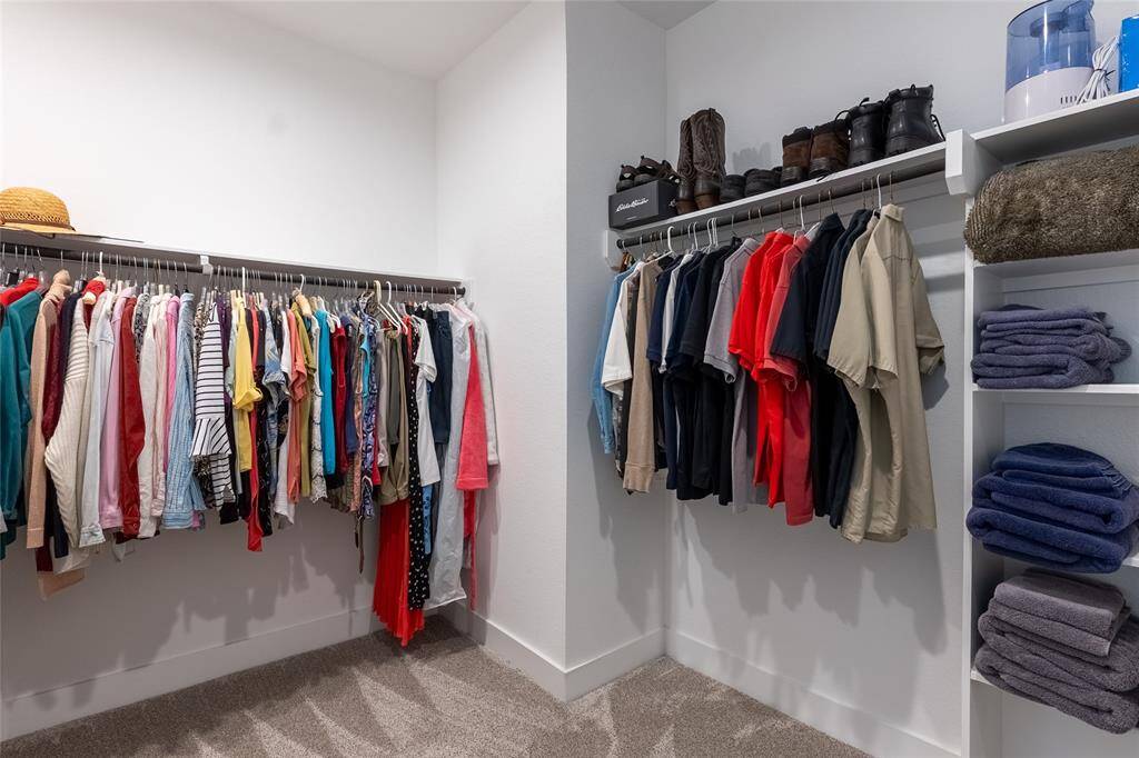 View of second of 2 large walk in closets in Primary Bathroom