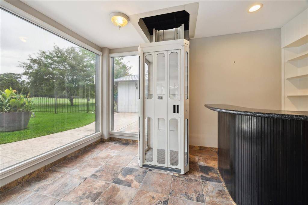 Elevator to upper left and bedroom.Elevator to upper left and bedroom.