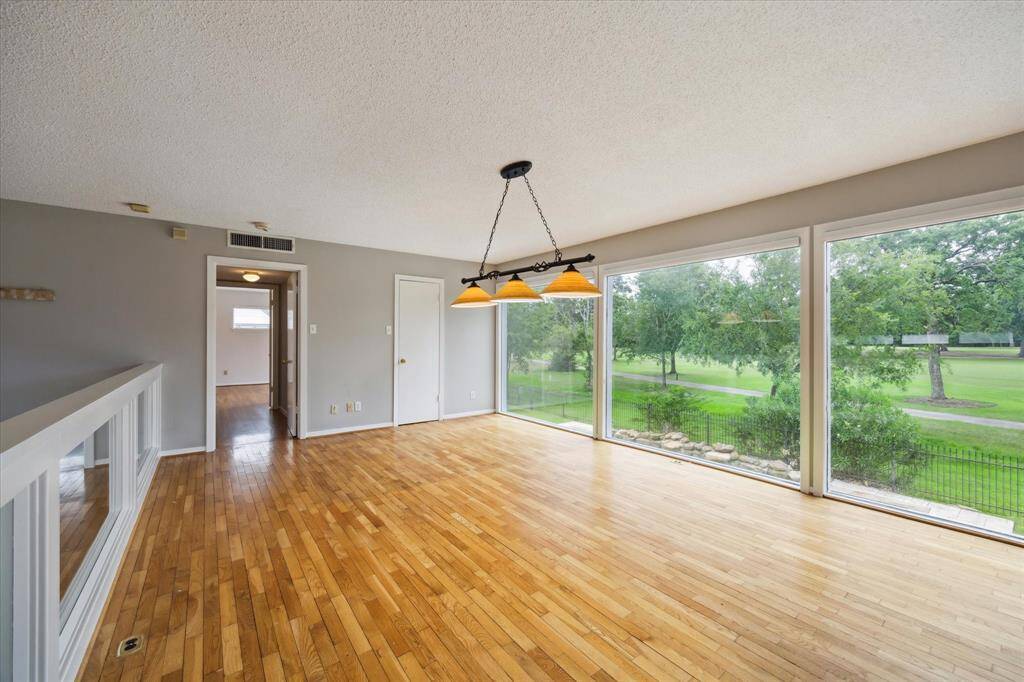 Loft view of golf course.  Amazing amount of natural light in this home.