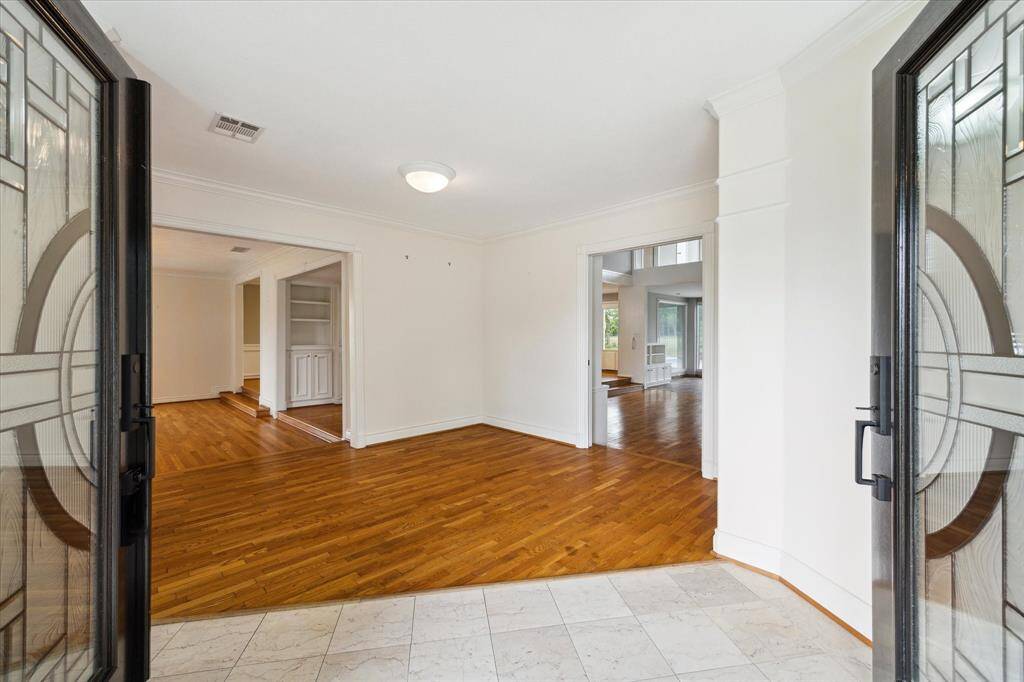 Front entry looking left to bonus room and office in front and family room to the right.