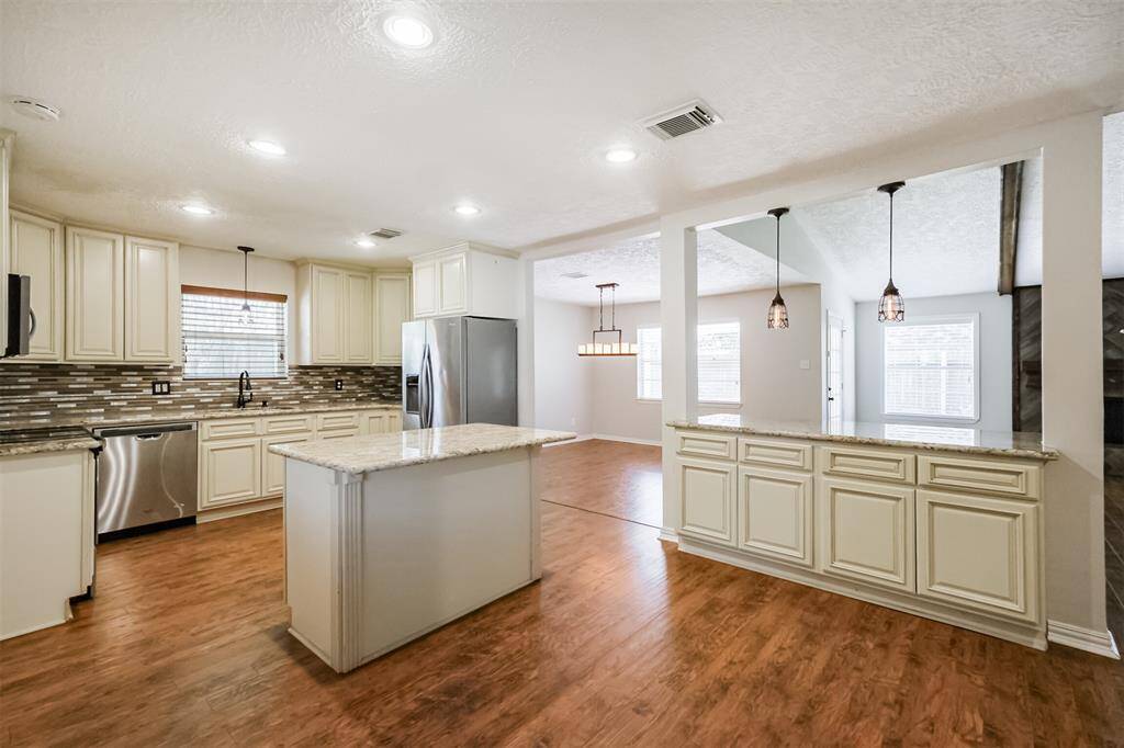 Between the island and the island bar in the kitchen it has plenty of space for everyday meals or these special occasions.