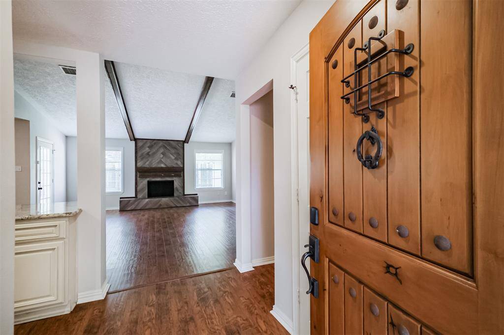 As you step through the front door notice the warmth and charm of this home along with engineered wood throughout.