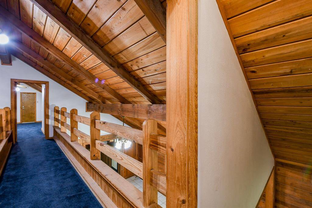 Landing and catwalk at the top of the staircase.