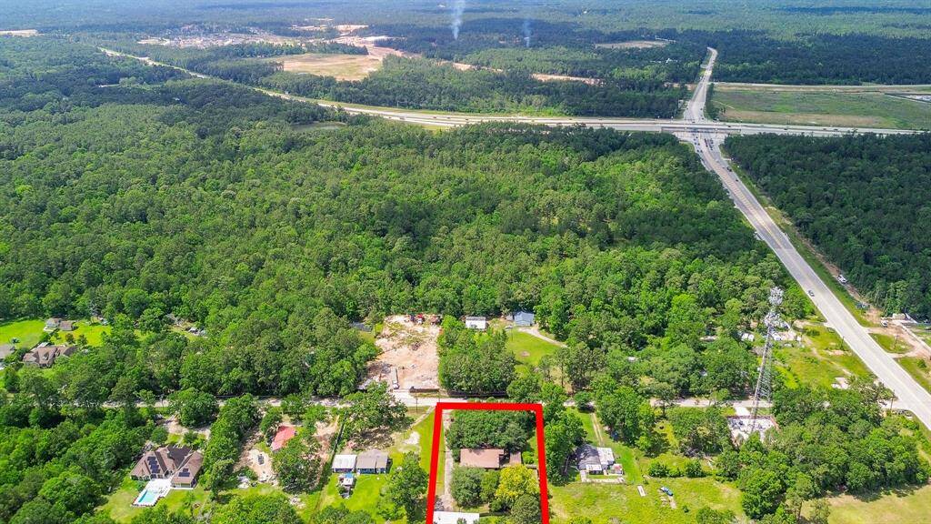 The property is located approximately 2.4 miles off 242 down Conroe Porter Rd. and about 6.6 miles from the Grand Parkway.