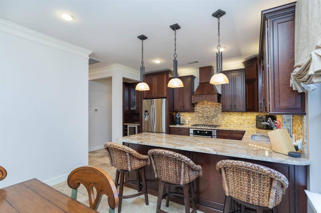Breakfast bar overlooks kitchen
