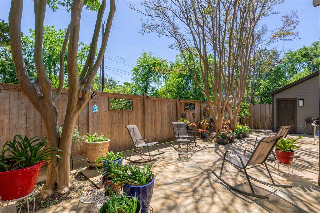 Private back patio...  Ravine behind the fence separates you from back neighors