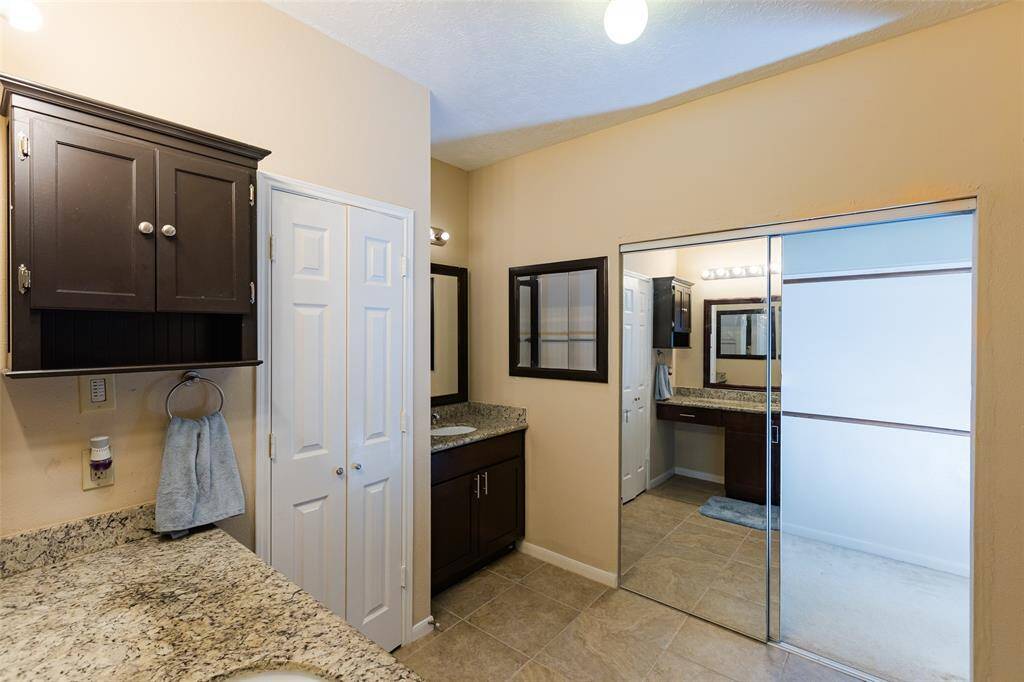 Mirrored door in the walk-in closet.