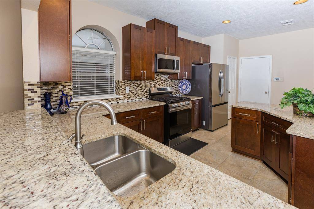 Many can work together in this lovely updated kitchen. New appliances.