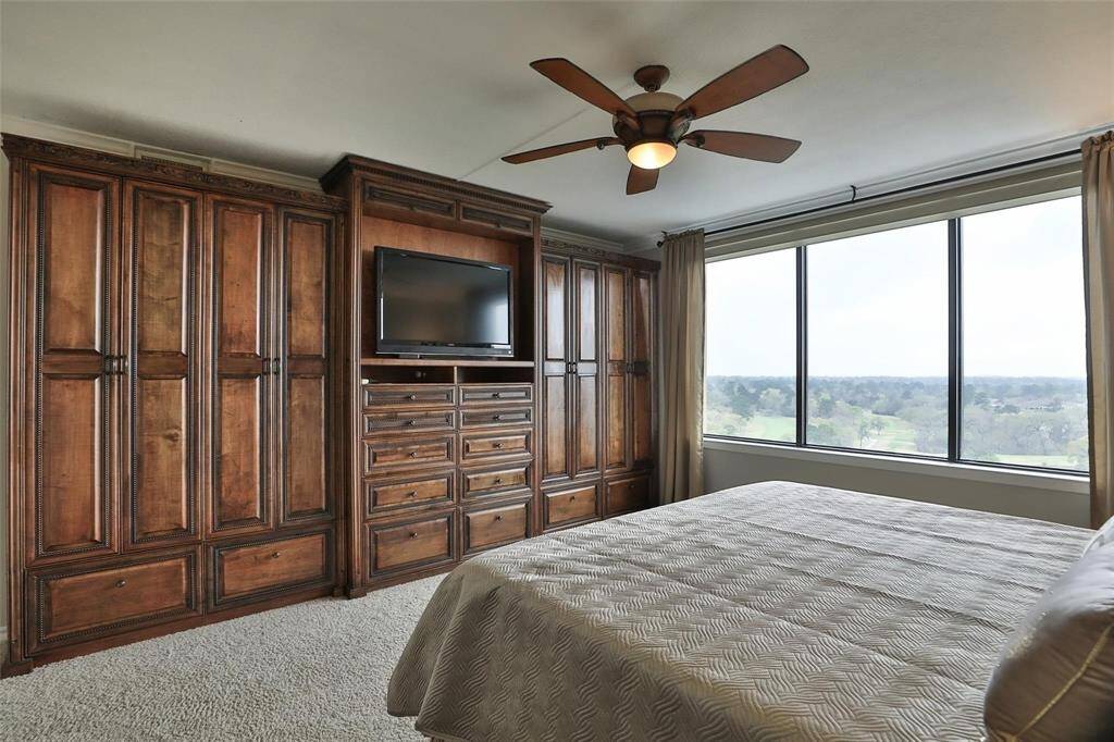 Great custom built in cabinetry provides loads of storage.