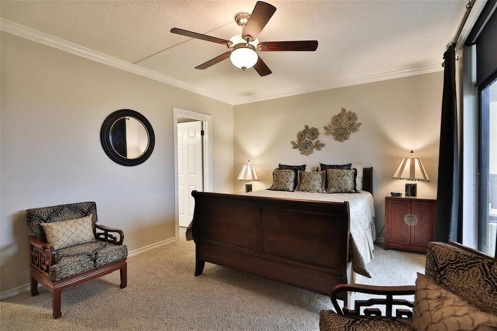 This fully furnished bedroom is on the south side of the building and has a private balcony.