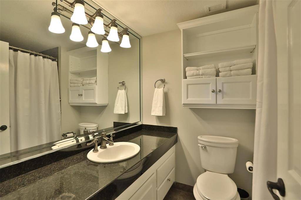 Another view of the bedroom to the left of the foyer.