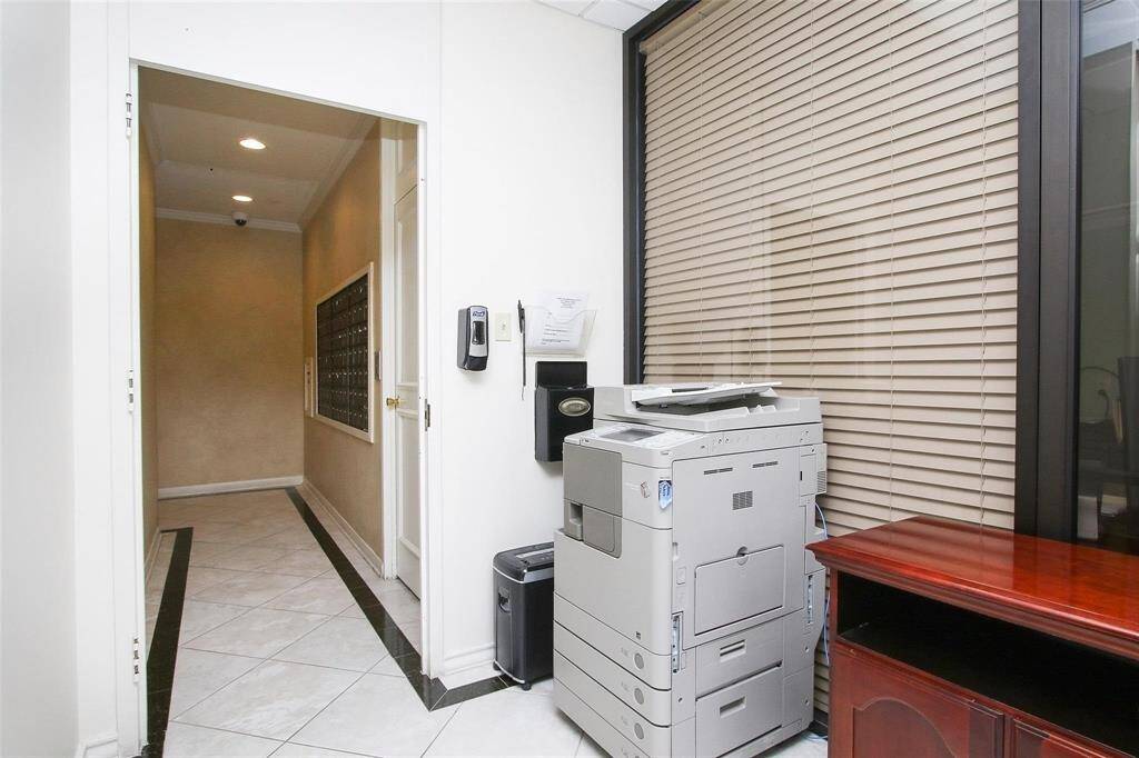 The entrance to the mail box area includes a copy machine.
