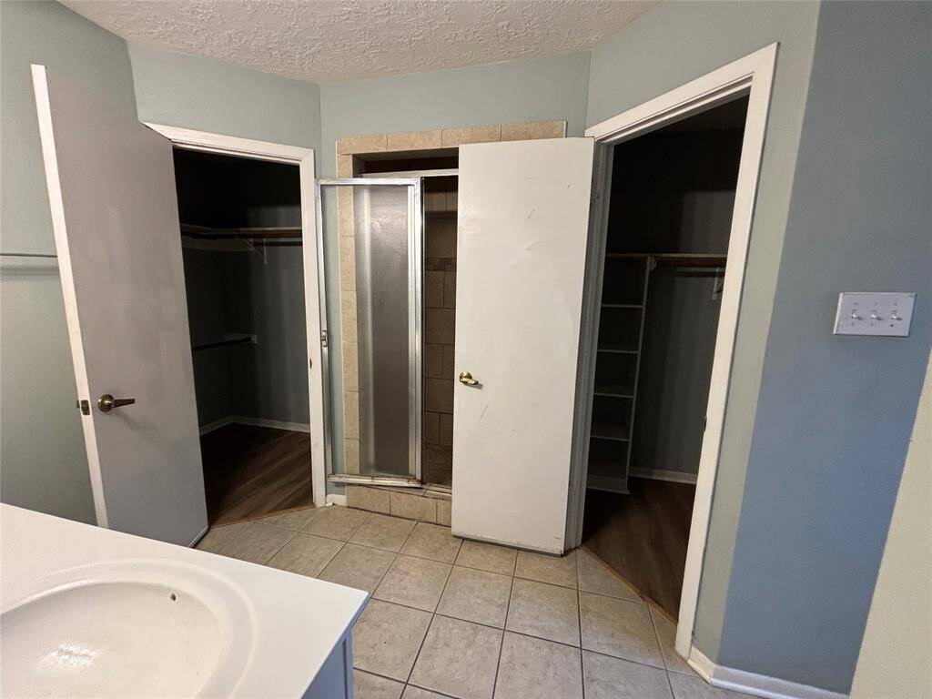 master bath room has 2 closet for women and men