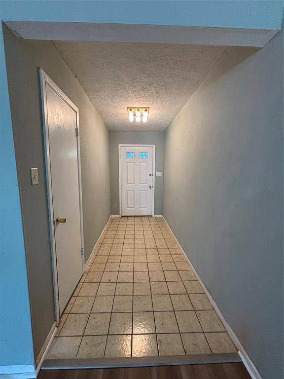 tile floor and laminated living room