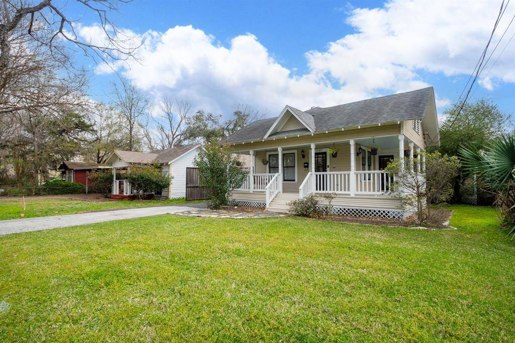 This beautifully maintained bungalow offers timeless charm with its welcoming front porch, classic design, and gated driveway. Surrounded by a well-kept lawn and mature landscaping, it’s the perfect blend of character and comfort.