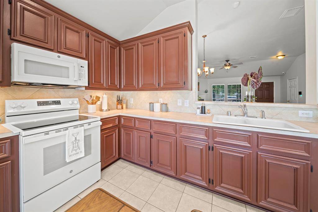 Notice the new stove and microwave (2024)