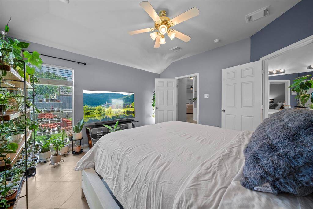 Primary bedroom located at the back of the home, great privacy.