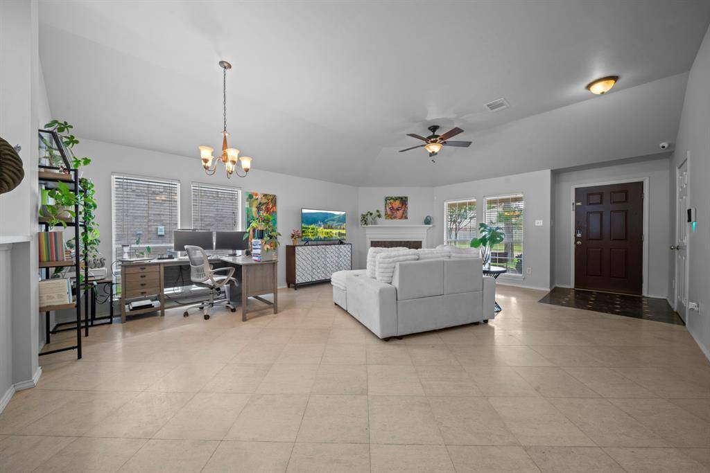 Open concept living area with options! A work space or a dining table!