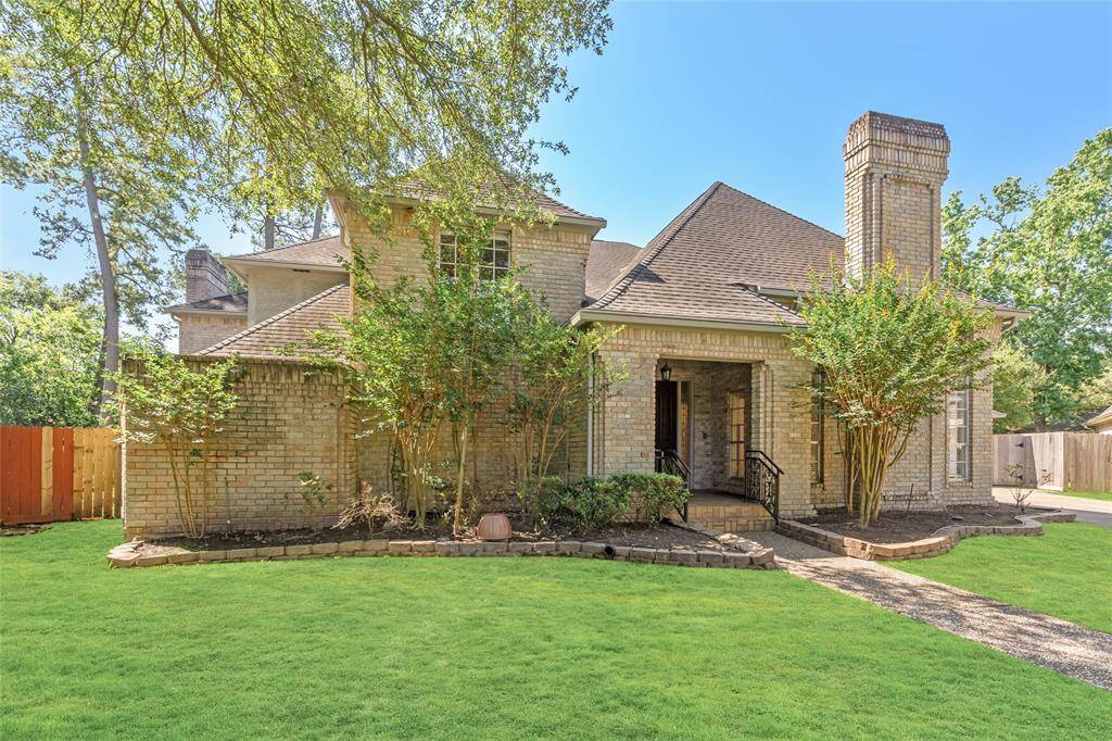 Your new home has a welcoming front porch in a tranquil neighborhood setting.