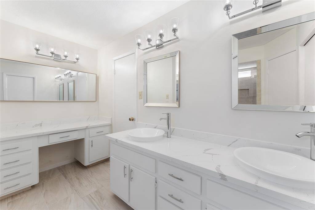 master bath 2 vanity areas, double sinks and 2 closets