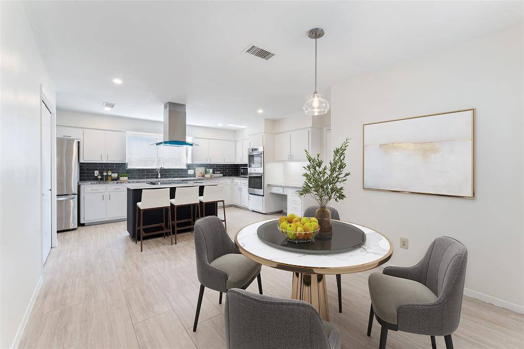 dining area open to large kitchen