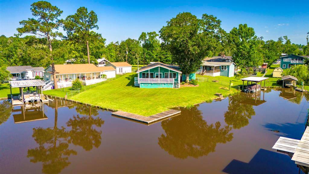 Lake house with large yard.