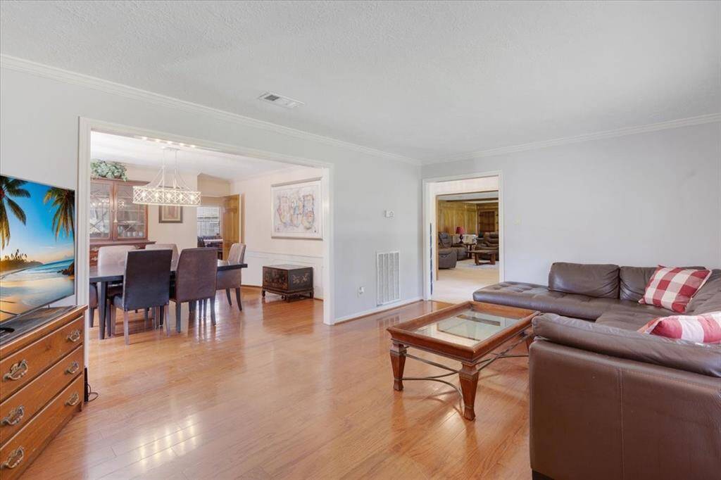 Formal sitting room with a view to the formal dining room.
