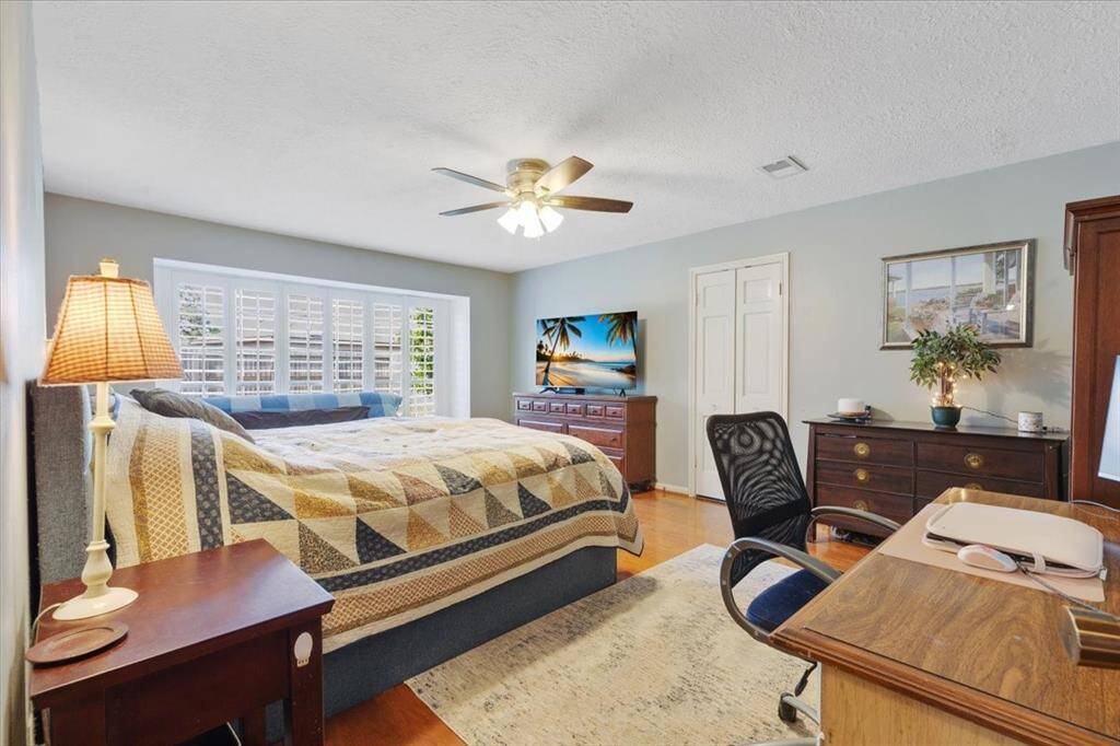 Oversized primary bedroom with en-suite and two walk in closets
