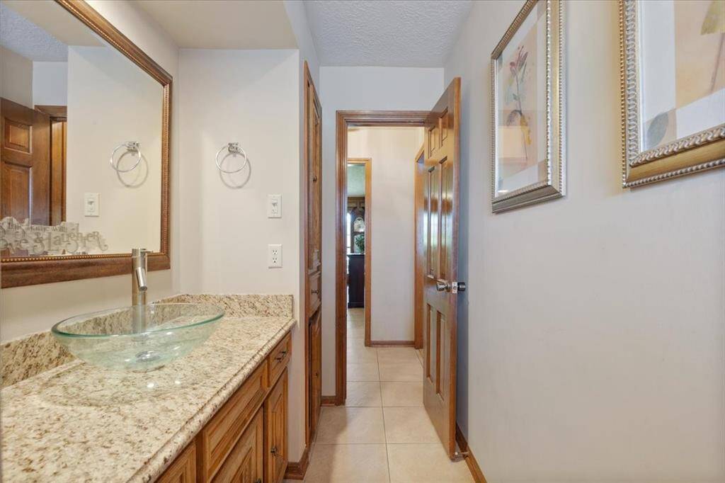 Half bath with glass sink