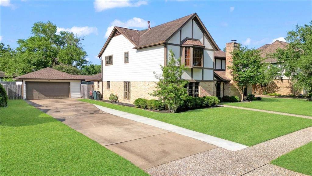 Long driveway allows for plenty of parking with a detached 2 car garage.
