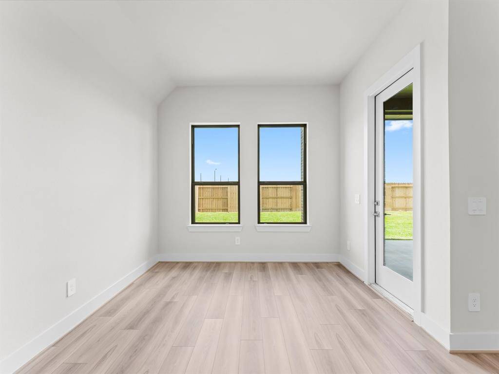 Breakfast with Access to the Covered Rear Patio and Fenced Back Yard