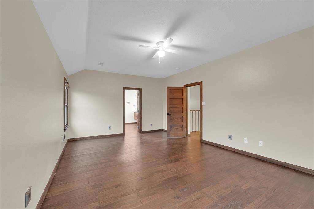 Wooden doors leading to all bedrooms.