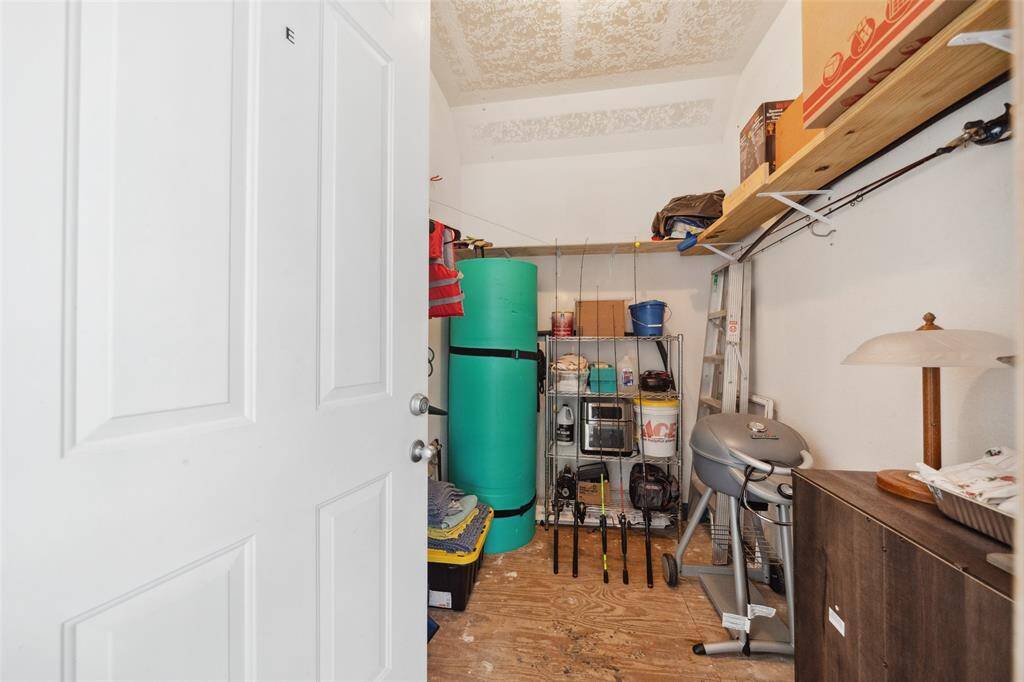 this Condo offers TWO storage units- picture referencing the larger one right outside of your front door for all your lake essentials.