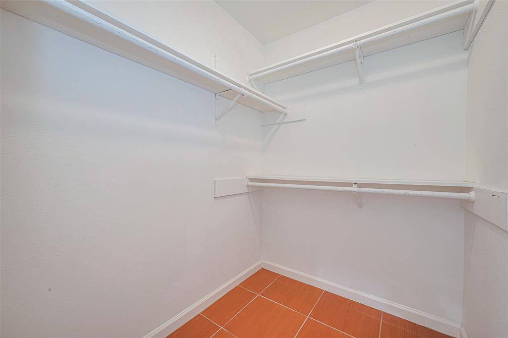 Closet in primary bedroom