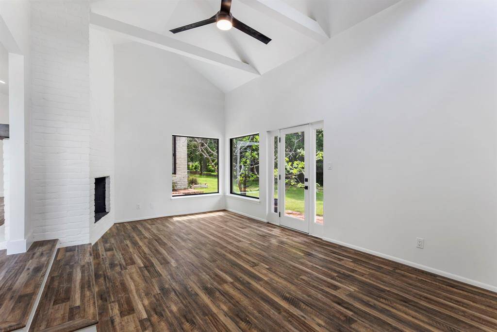 Great lighting and gorgeous views of the backyard from this area too!