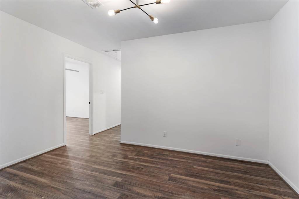 Flex space by the secondary bedrooms. Notice the new light fixtures.