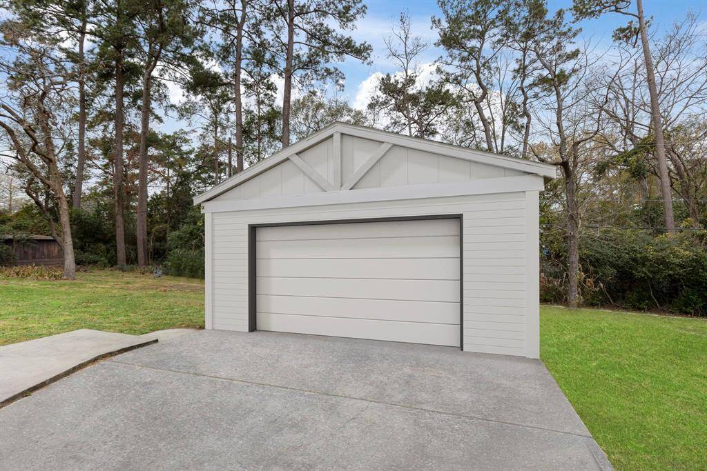 Curious about converting the carport into a two car garage? (Virtually Staged)